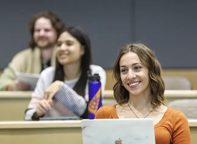 Two students sitting in class